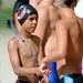 Yosue Gonzalez, 11, of Milan, waits his turn to swim the 50 fly during the Washtenaw Interclub Swim Conference championships at Skyline High School on Thursday, July 25, 2013. Melanie Maxwell | AnnArbor.com